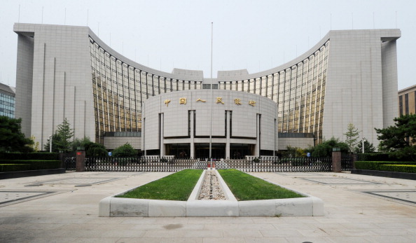 A picture shows the headquarters of the People's Bank of China (PBC or PBOC), the Chinese central bank, in Beijing on August 7, 2011. Standard & Poor's US debt downgrade was a wake-up call for the world, a commentary in a top Chinese state newspaper said on August 7, adding that Asian exporters faced special risks. China is the largest foreign holder of US Treasuries. AFP PHOTO / MARK RALSTON (Photo credit should read MARK RALSTON/AFP/Getty Images)