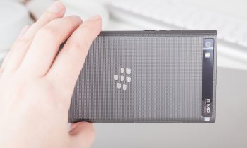 Woman holding a BlackBerry Leap smartphone